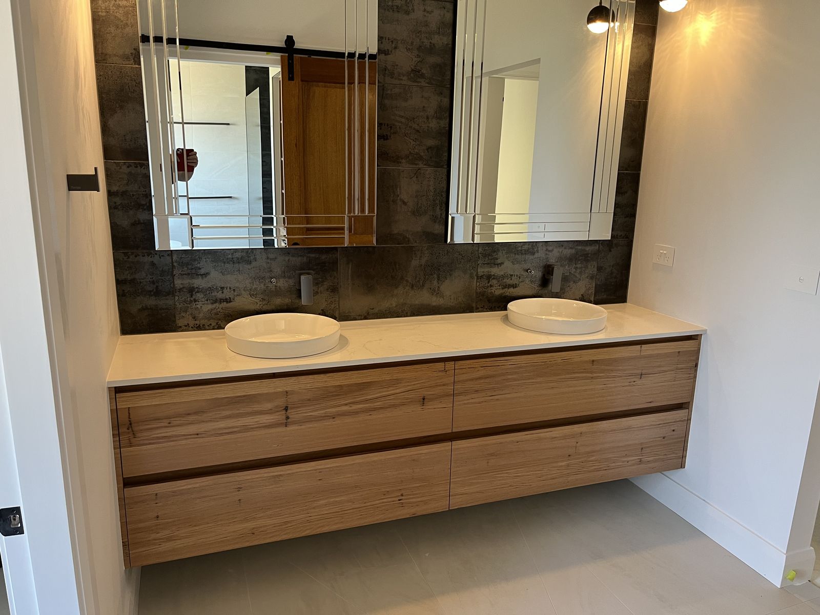 Classic white shaker vanity with double basins and cup-pull handles