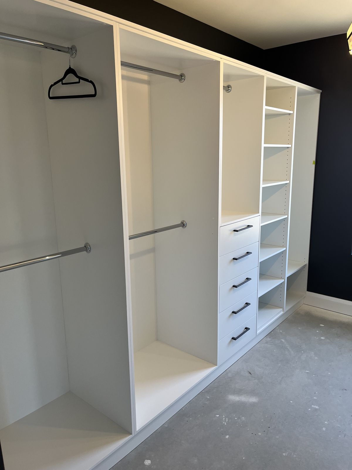 White wardrobe joinery with soft-close drawers and shelving